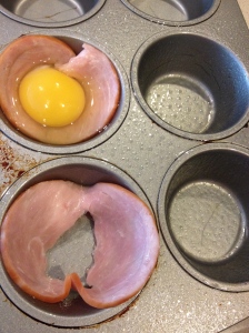 Slit the canadian bacon so the egg can seep through.